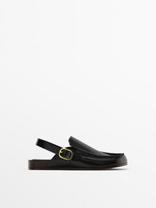 Leather Moc Toe Clogs With Metal Buckle offers at $219 in Massimo Dutti