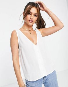 ASOS DESIGN v-neck crinkle tank top with shell buttons in ivory offers at $13.86 in Asos